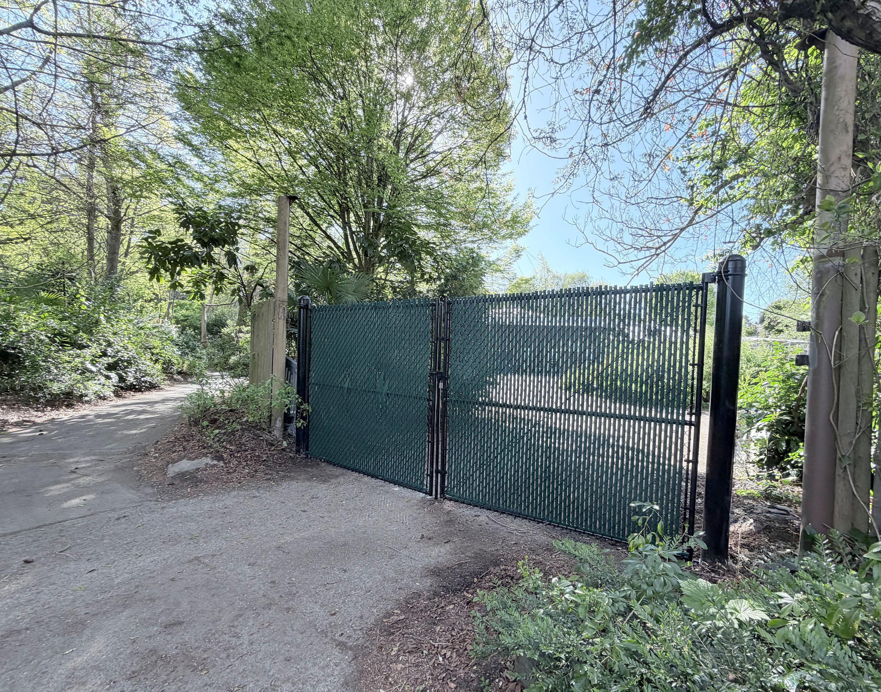 commercial fence installed by top rail fence
