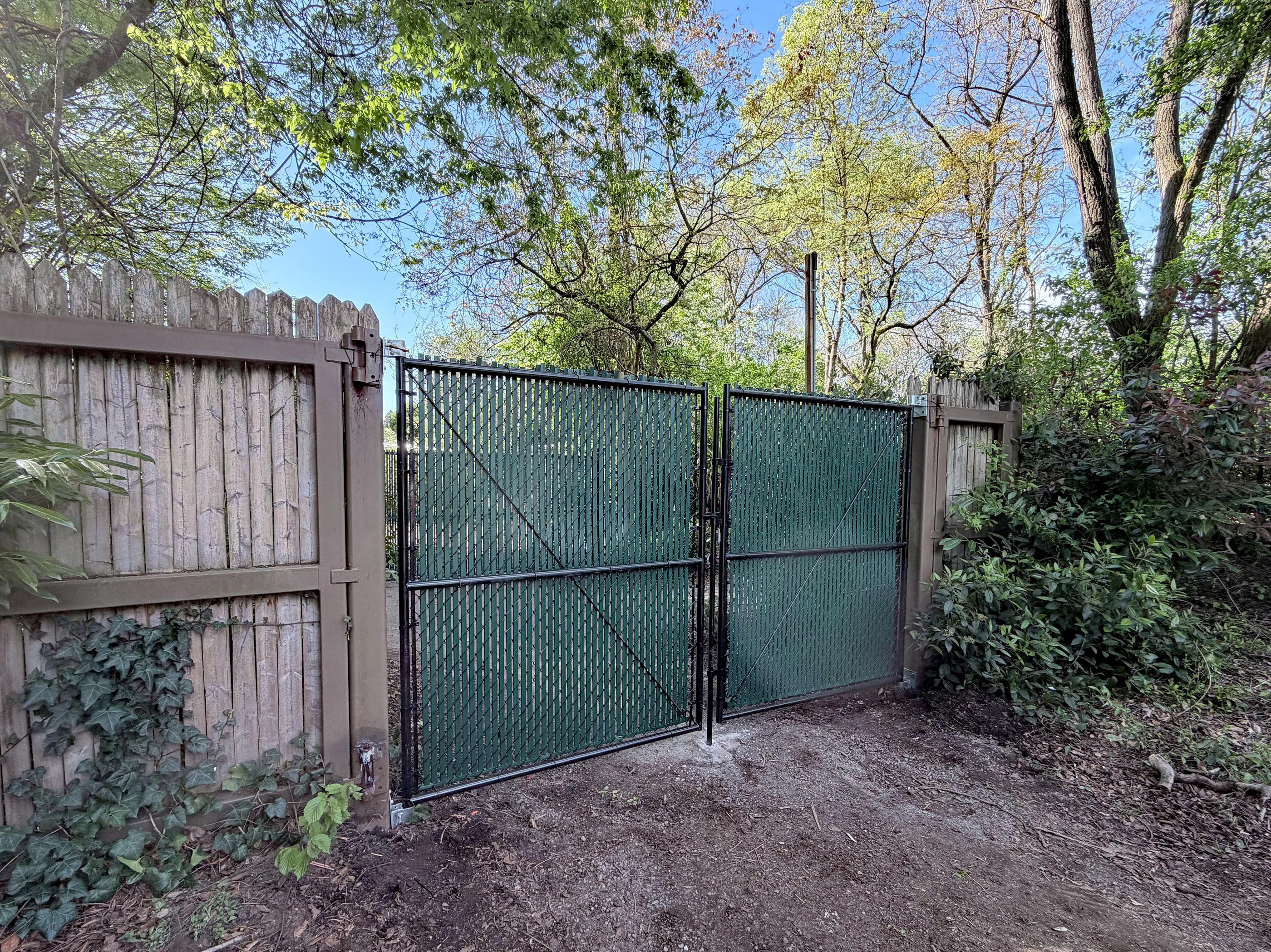commercial fence installed by top rail fence
