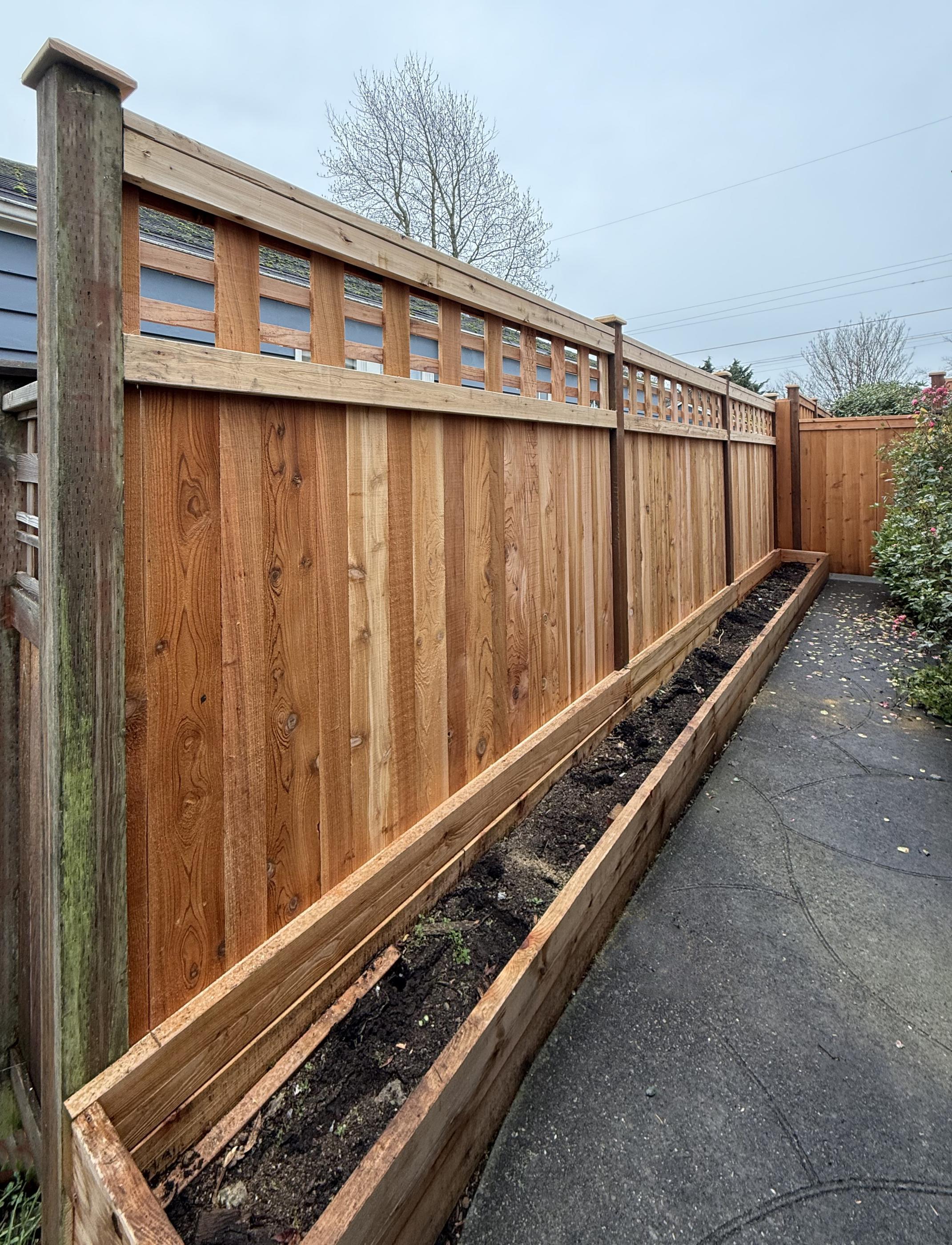 Lattice top fence installed by top rail fence
