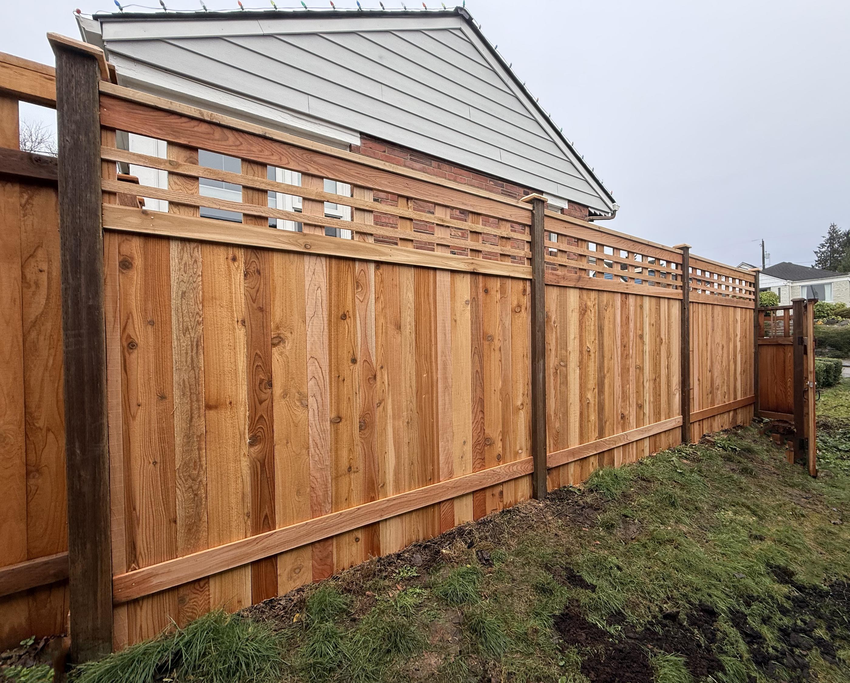 Lattice top fence installed by top rail fence
