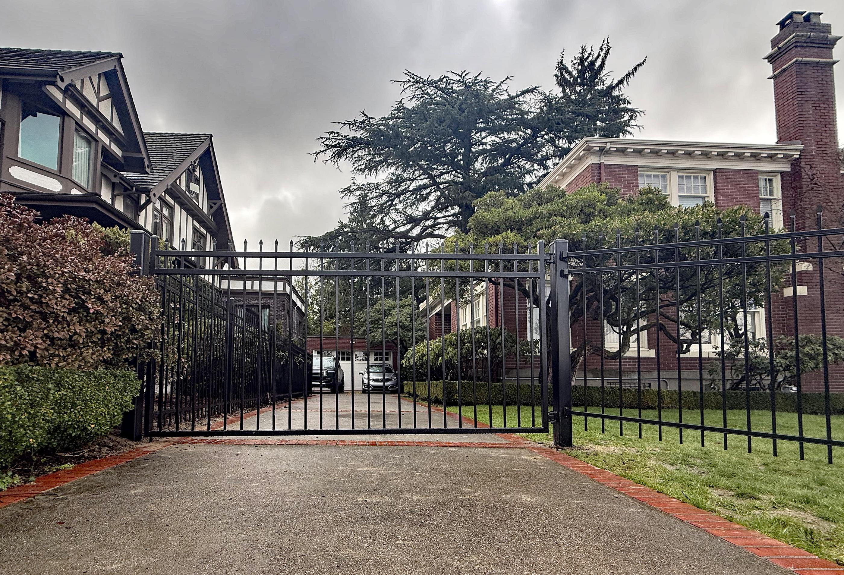 ornamental metal picket fence installed by top rail fences