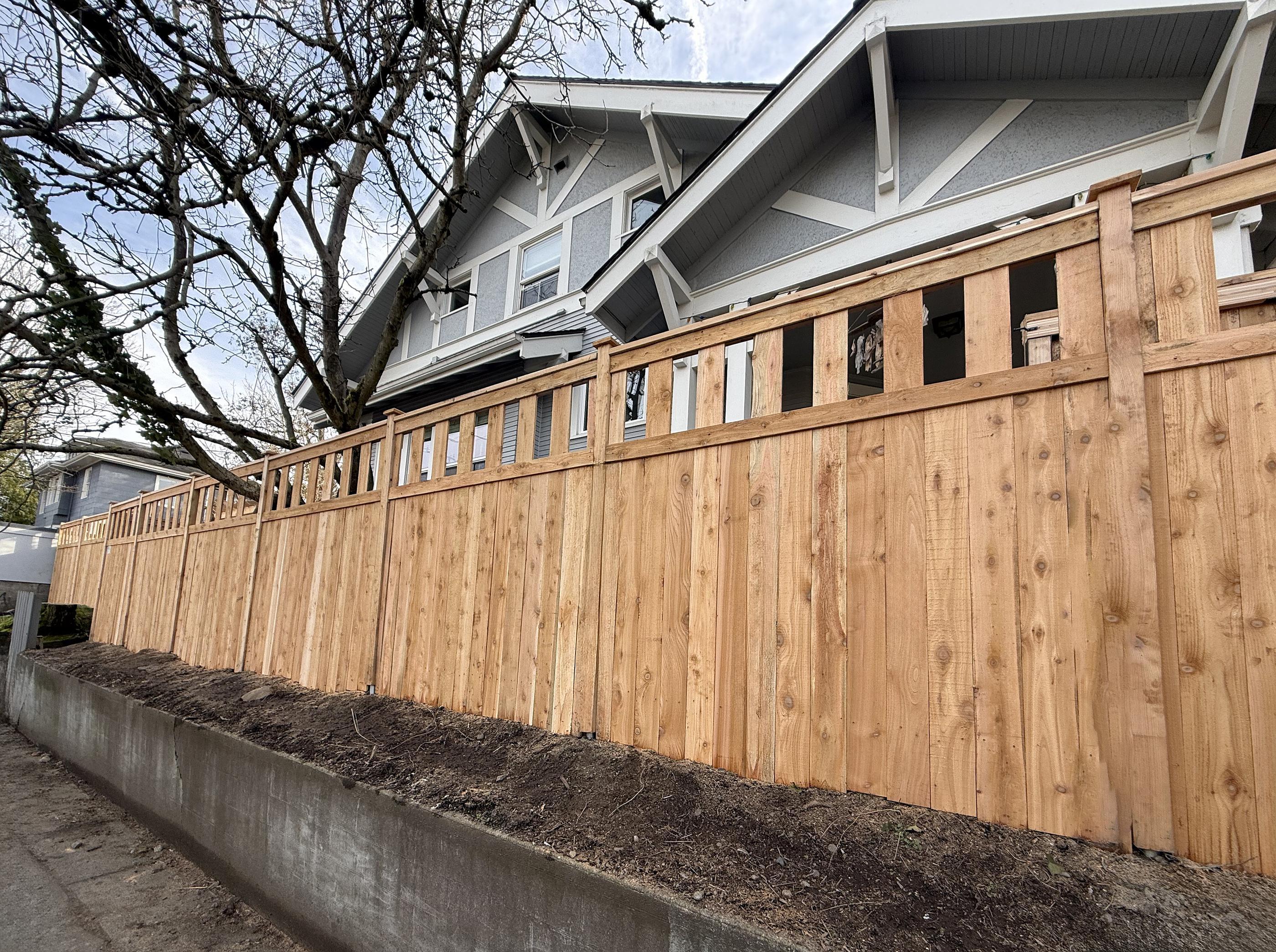 Lattice top fence installed by top rail fence