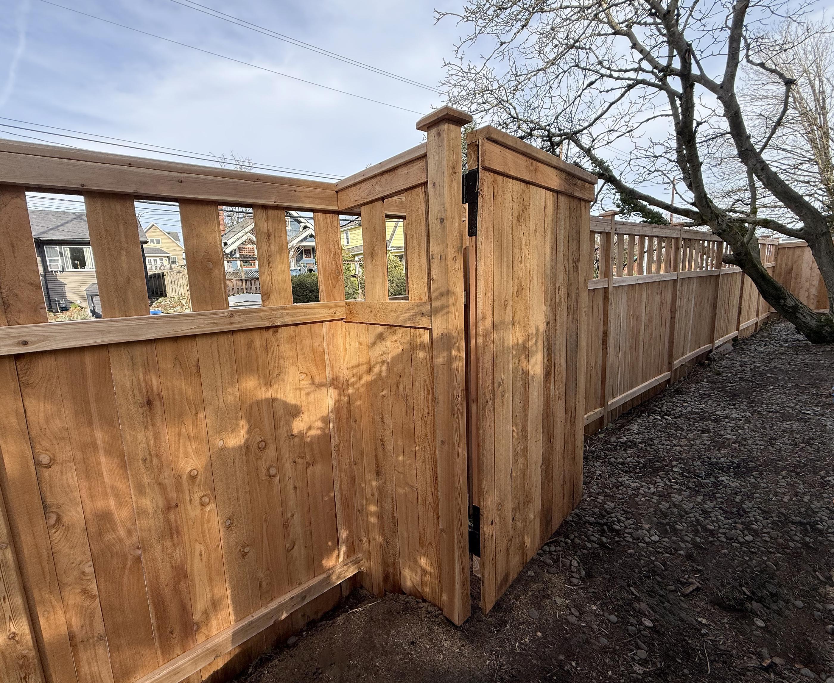 Lattice top fence installed by top rail fence