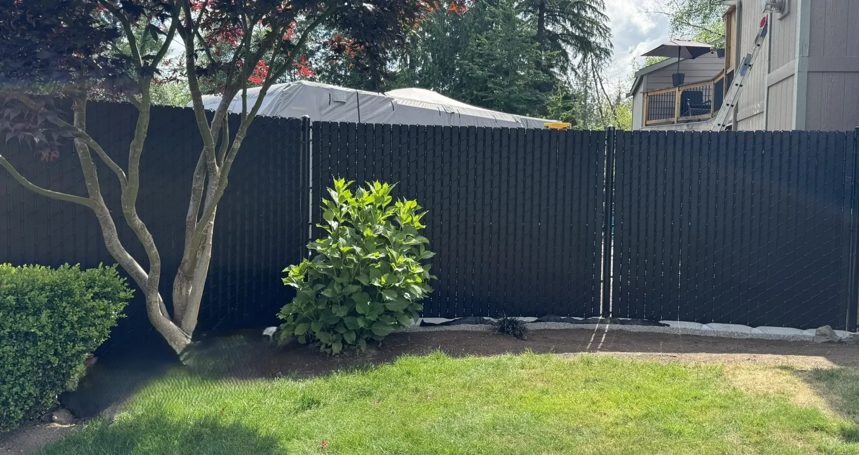 privacy chain link fence installed by top rail fence