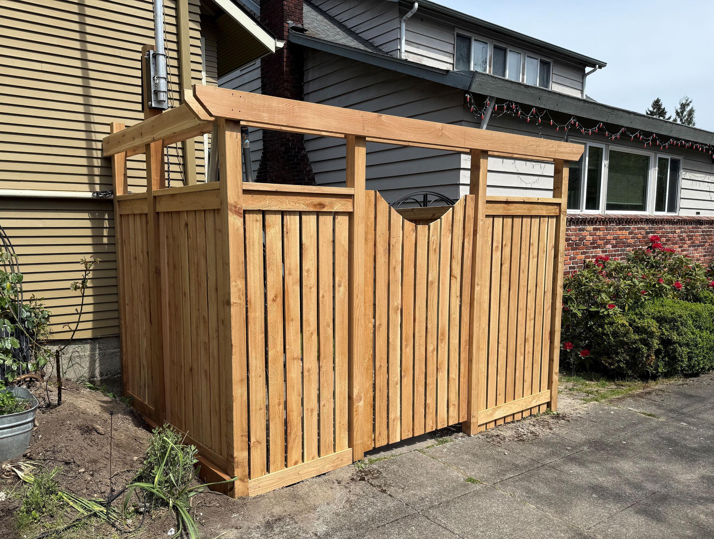 wood entry installed by top rail fence