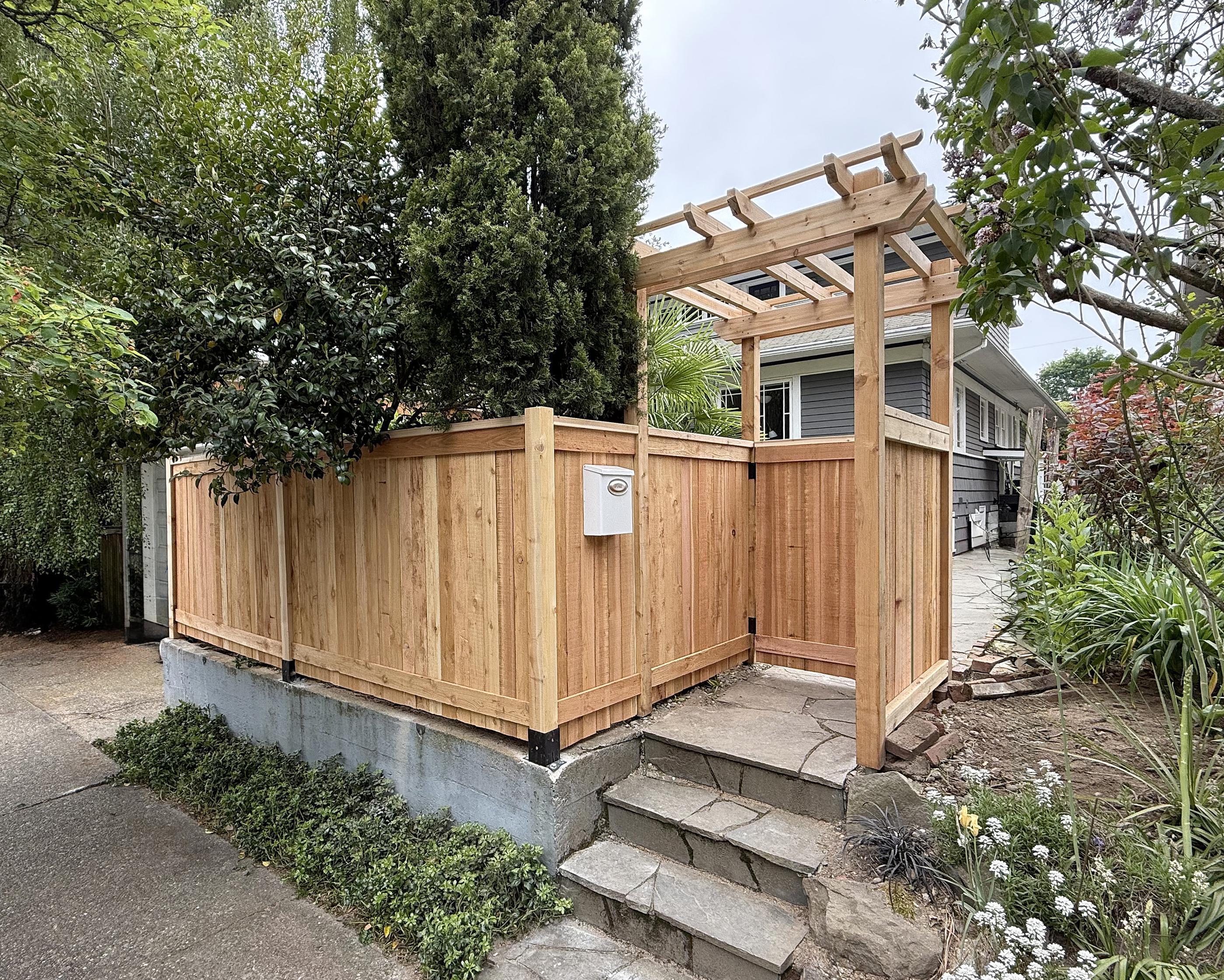 wood entry installed by top rail fence