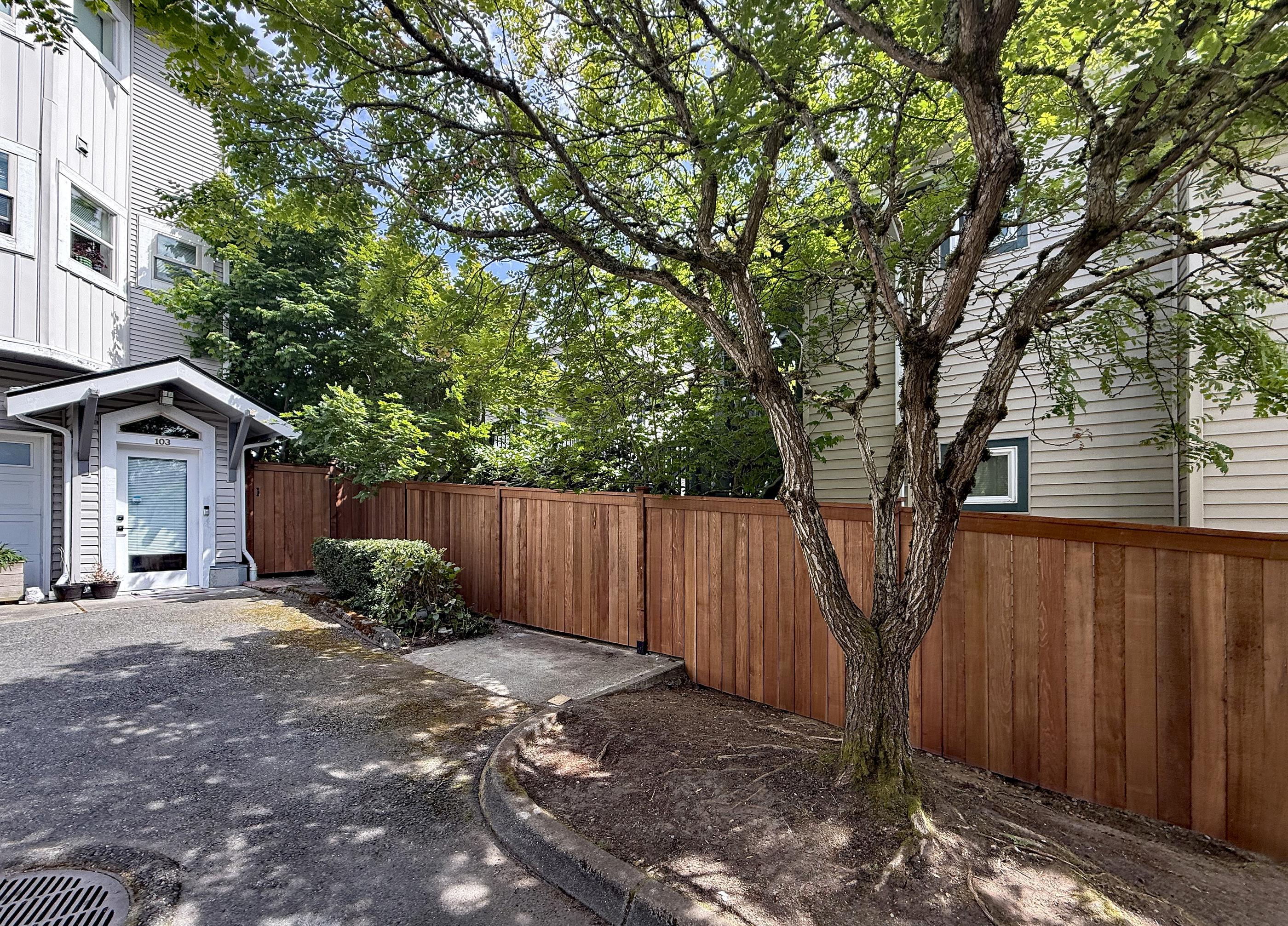 wood privacy fence installed by top rail fence