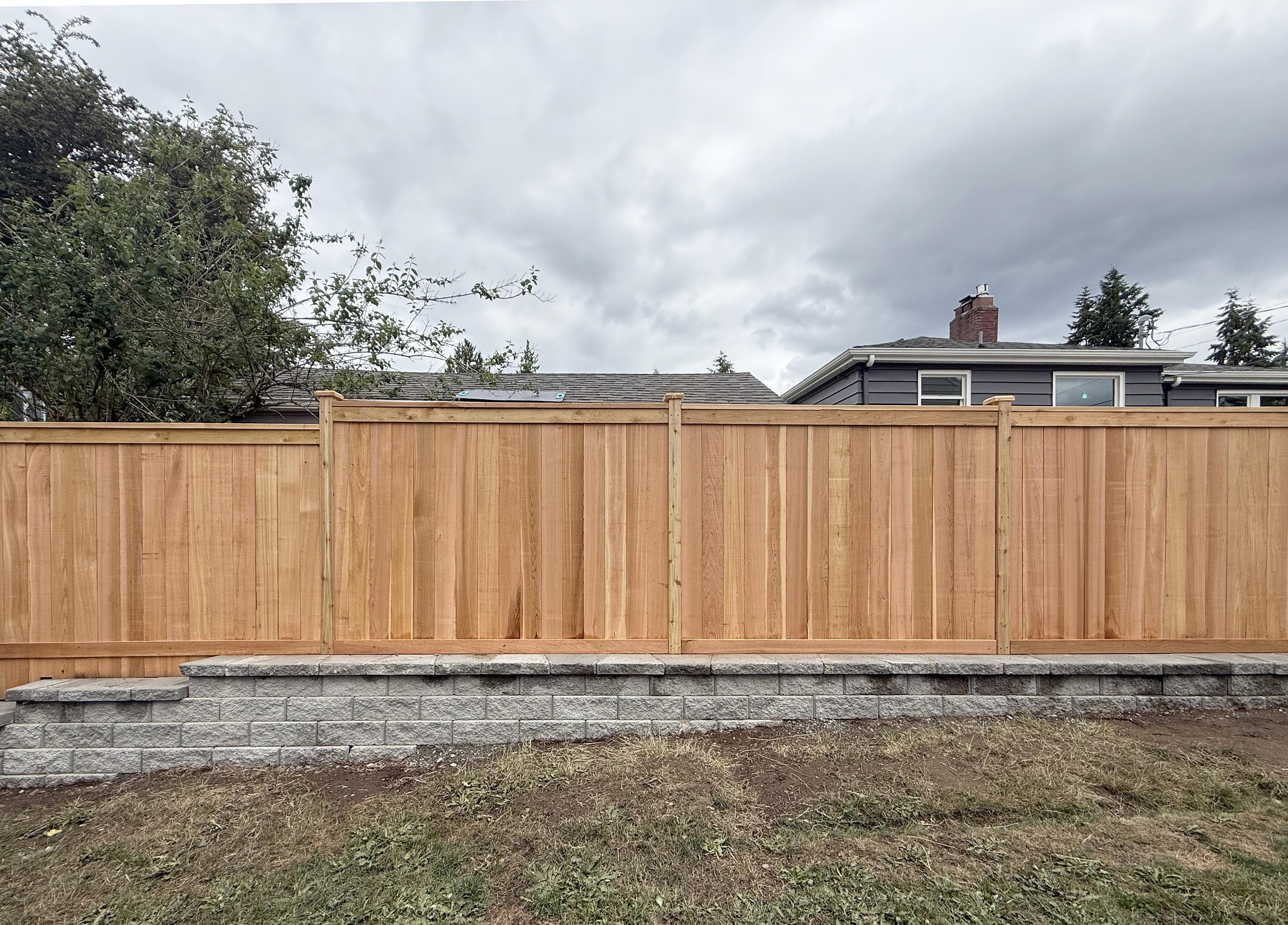 wood privacy fence installed by top rail fence