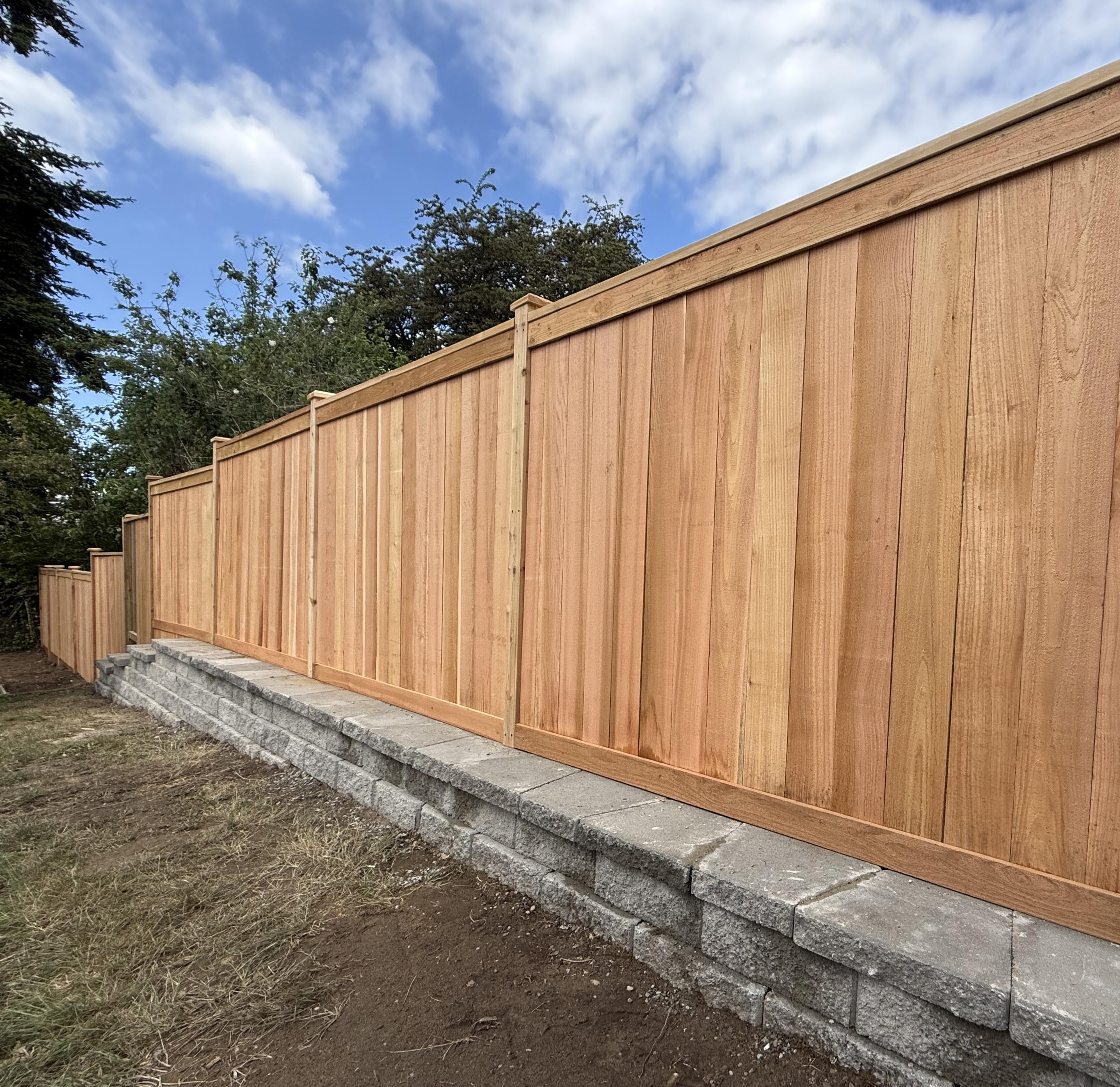 wood privacy fence installed by top rail fence