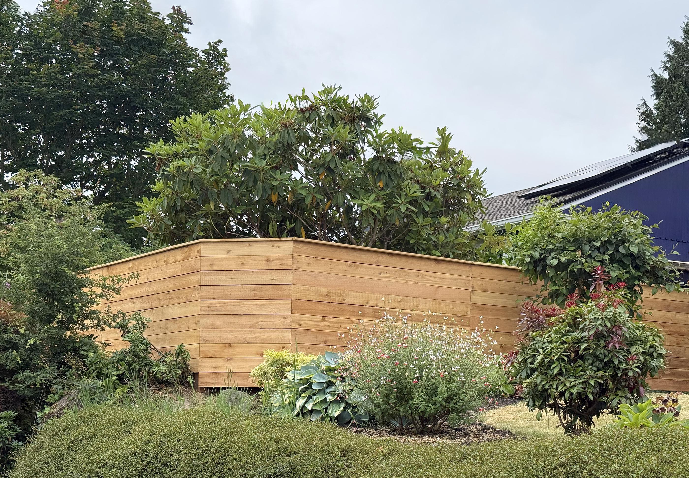 wood horizontal fence installed by top rail fence