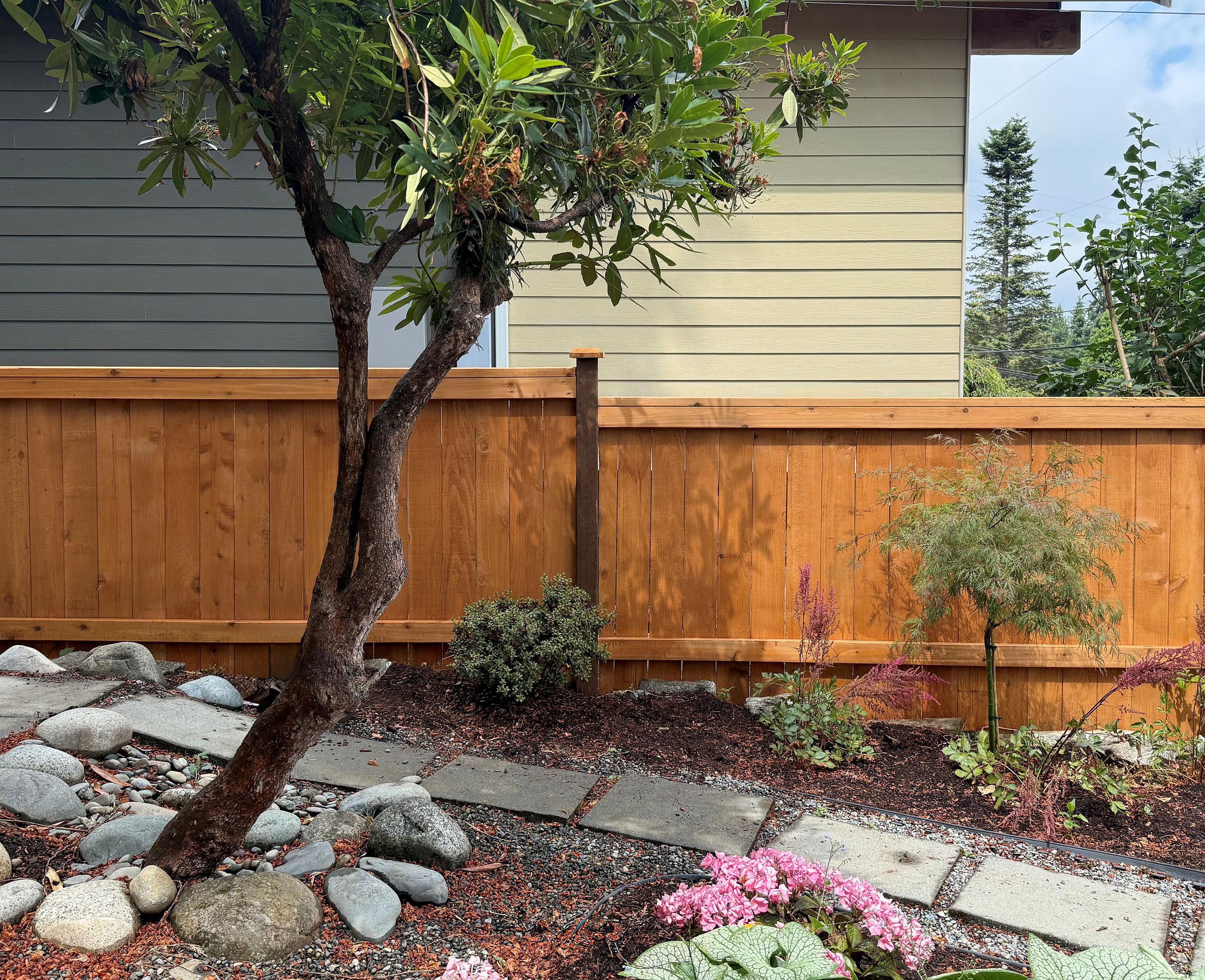 wood cap and trim fence installed by top rail fence