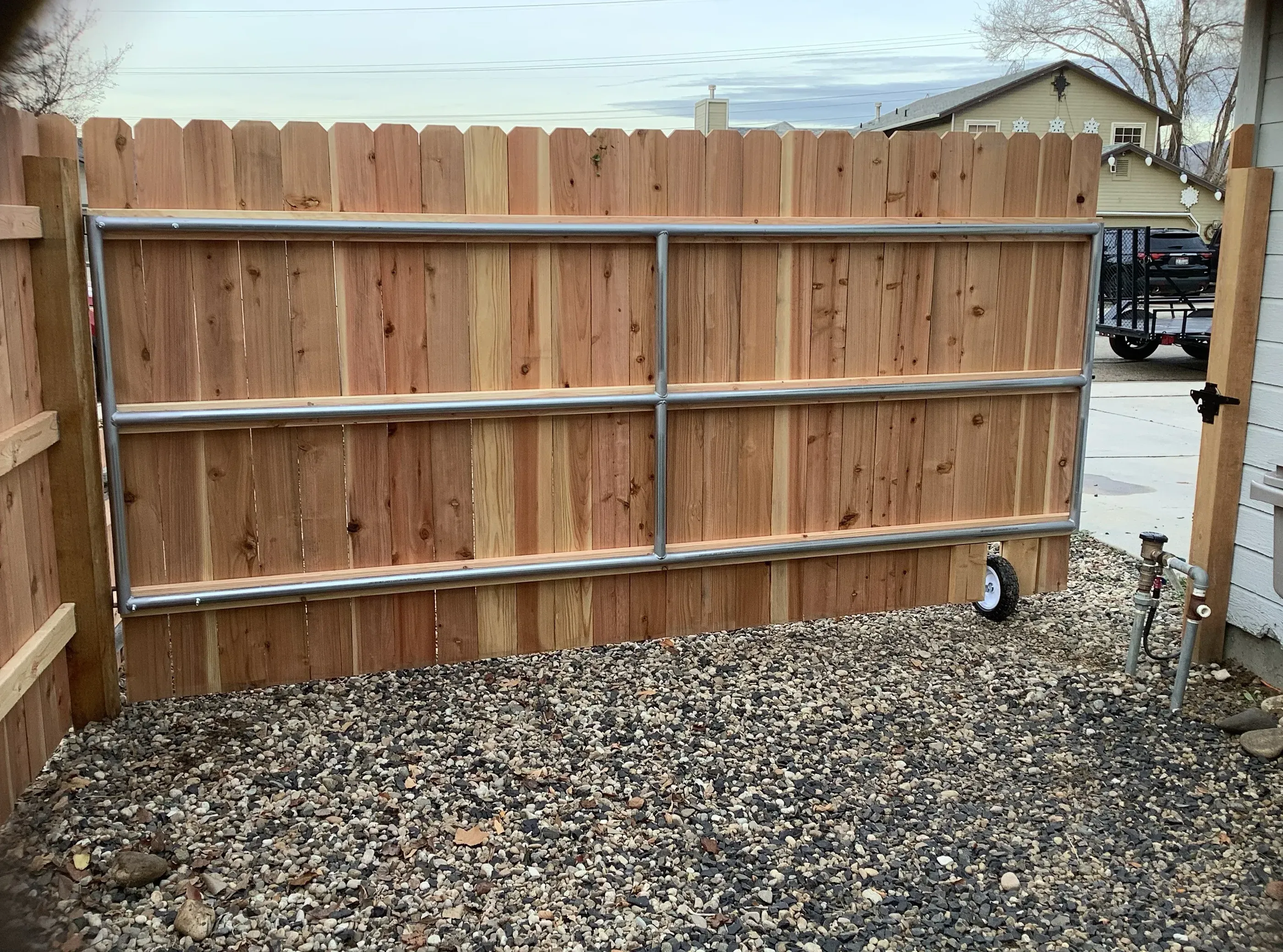 wood stockade fence installed by top rail fence