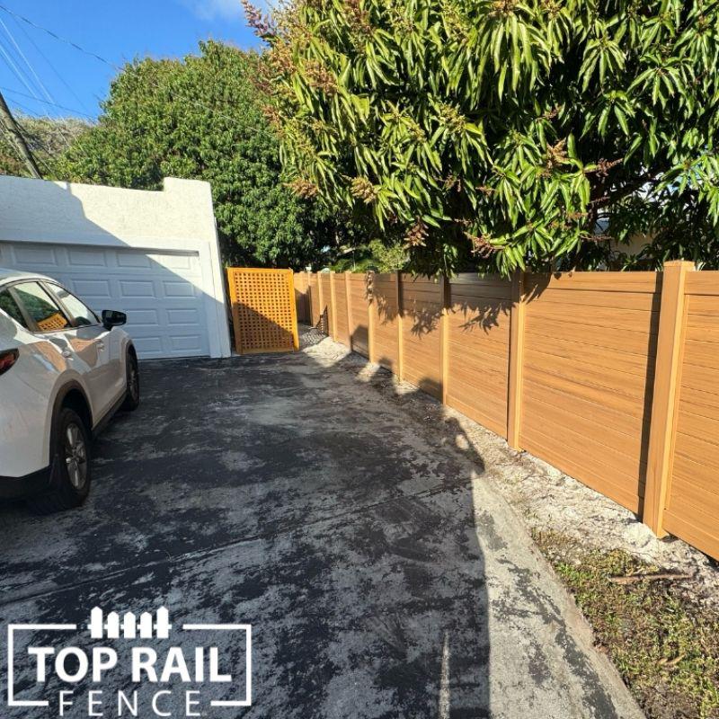 Vinyl cypress color pirvacy fence installed by Top Rail Fence