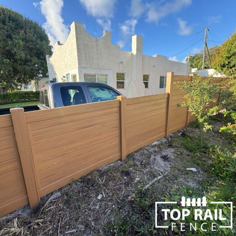 Vinyl cypress color pirvacy fence installed by Top Rail Fence