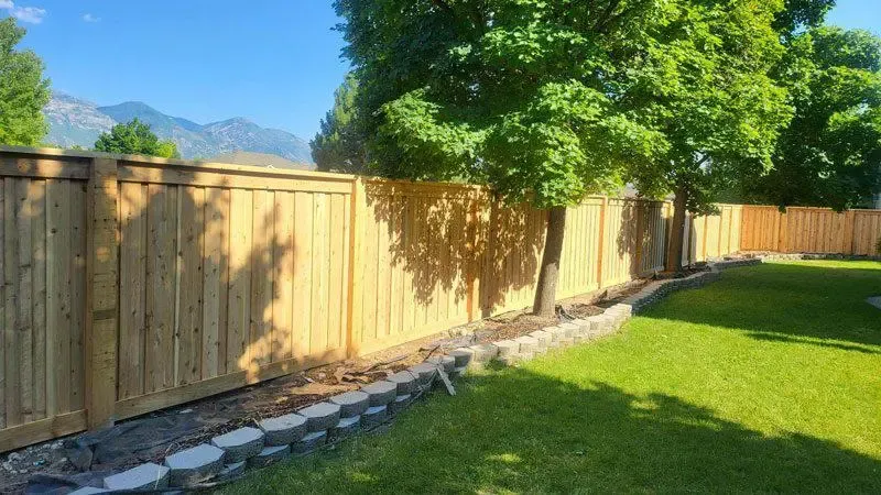  wood fence installed by top rail fence