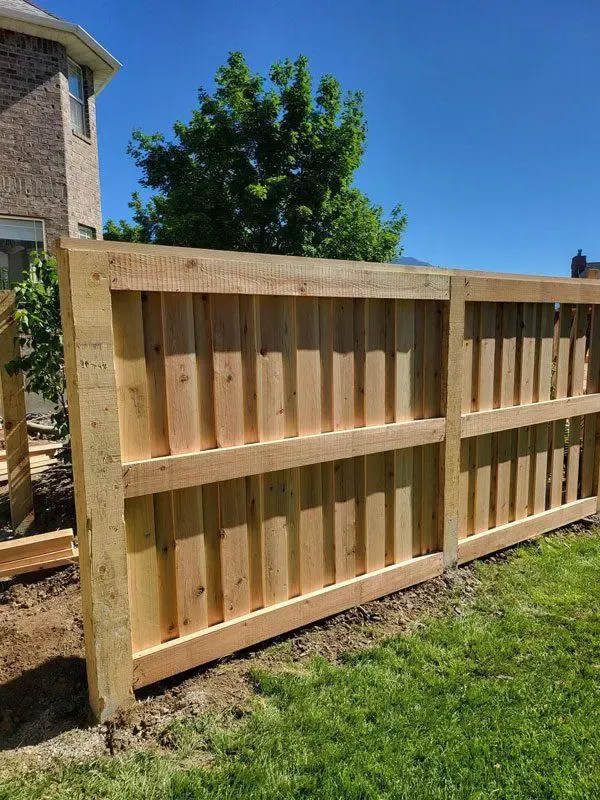  wood fence installed by top rail fence