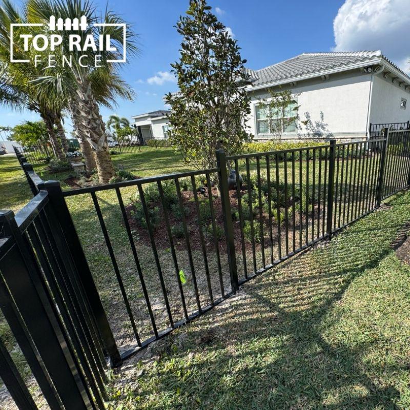 aluminum fence install by Top Rail Fence