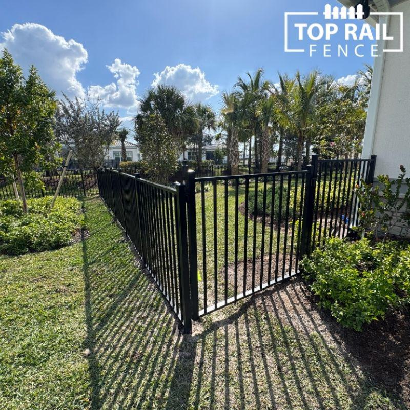 aluminum fence install by Top Rail Fence