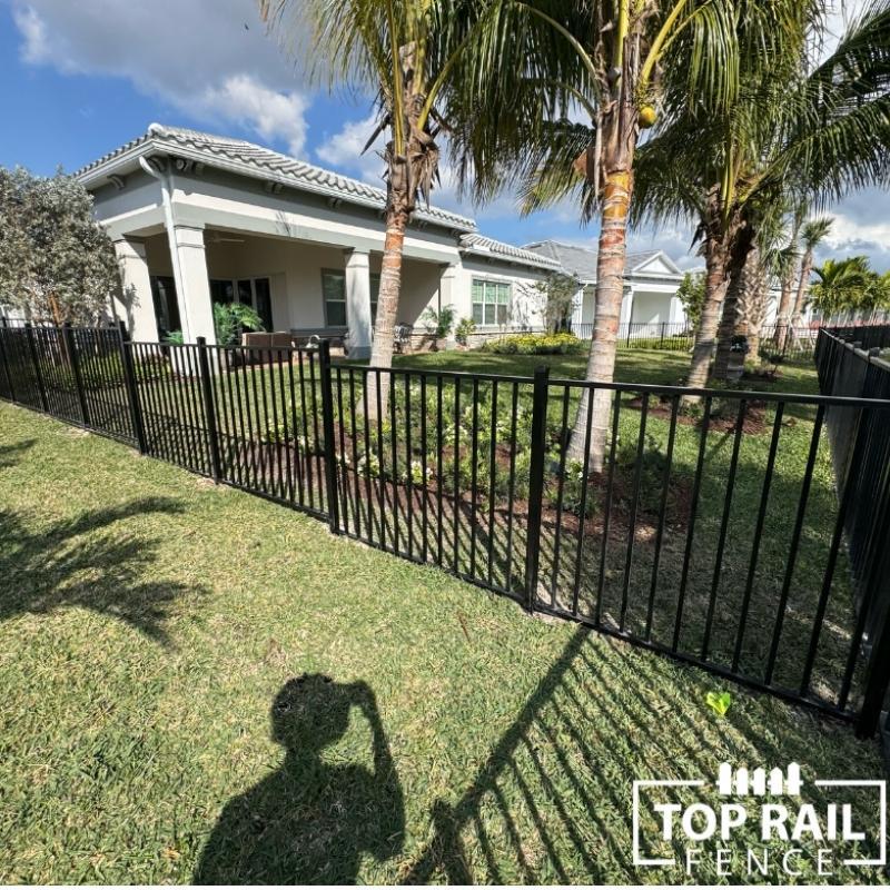 aluminum fence install by Top Rail Fence