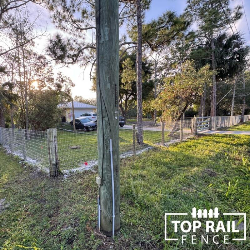 no climb horse wire fence installed by Top Rail Fence