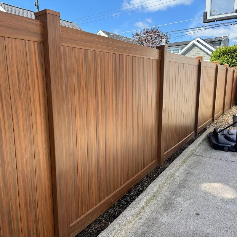 Wood Grain Vinyl Fence Installation