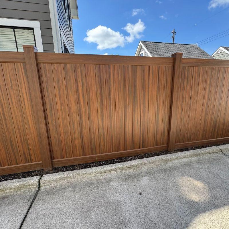 vinyl fence installed by top rail fence