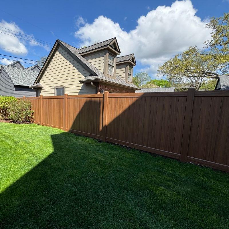 vinyl fence installed by top rail fence