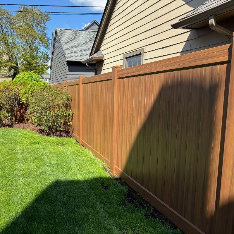 vinyl fence installed by top rail fence