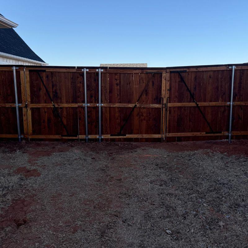 cedar cap and trim fence installed by top rail fence oklahoma city