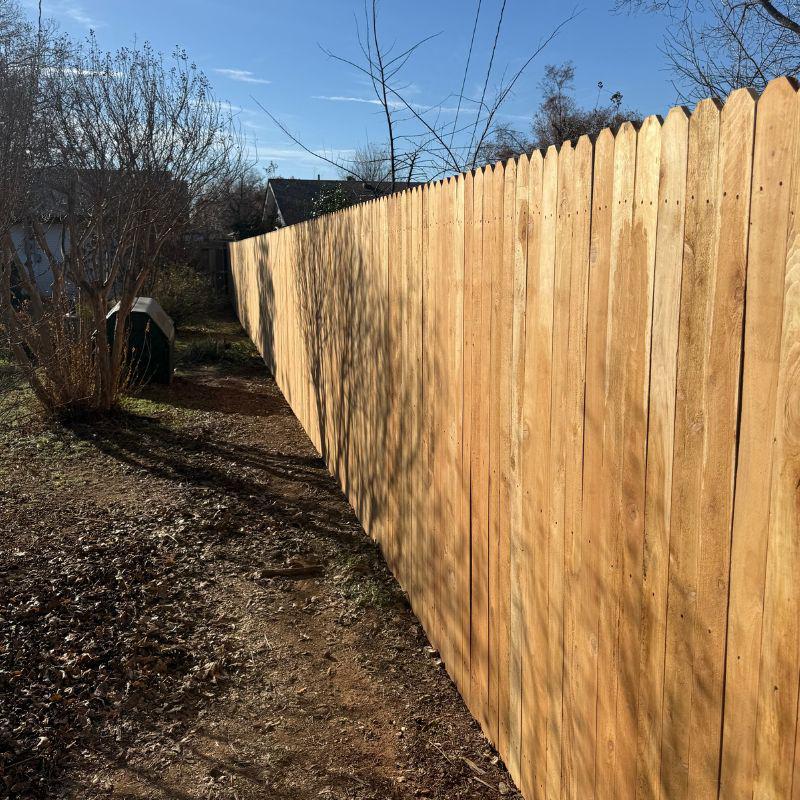 wood stockade fence installed by top rail fence oklahoma city