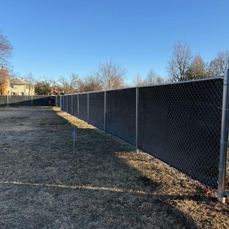  chain link fence installed by top rail fence
