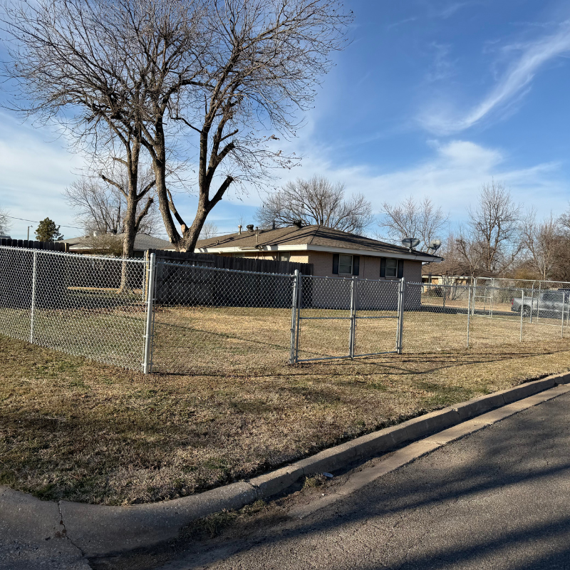 galvanized chain link fence installed by top rail fence