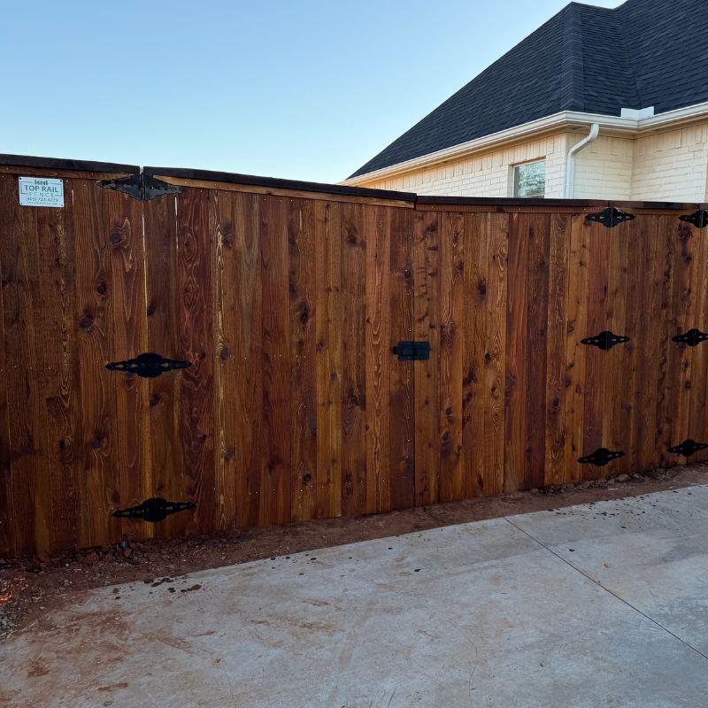 cedar cap and trim fence installed by top rail fence oklahoma city