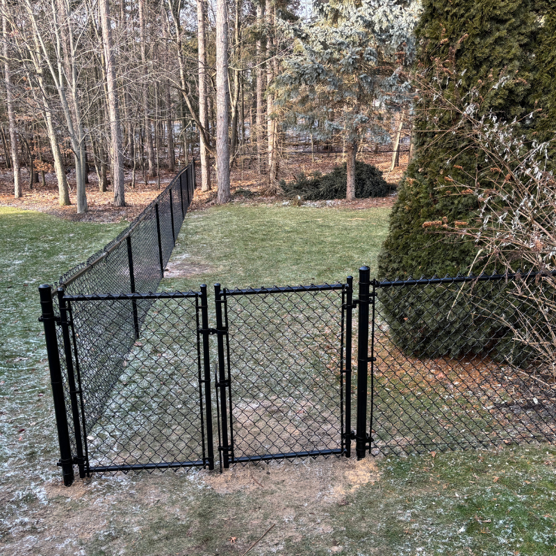 chain link fence installed by top rail fence