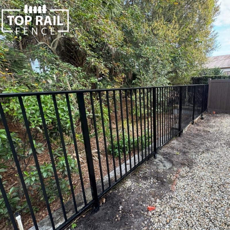 Aluminum metal fence install from Top Rail Fence