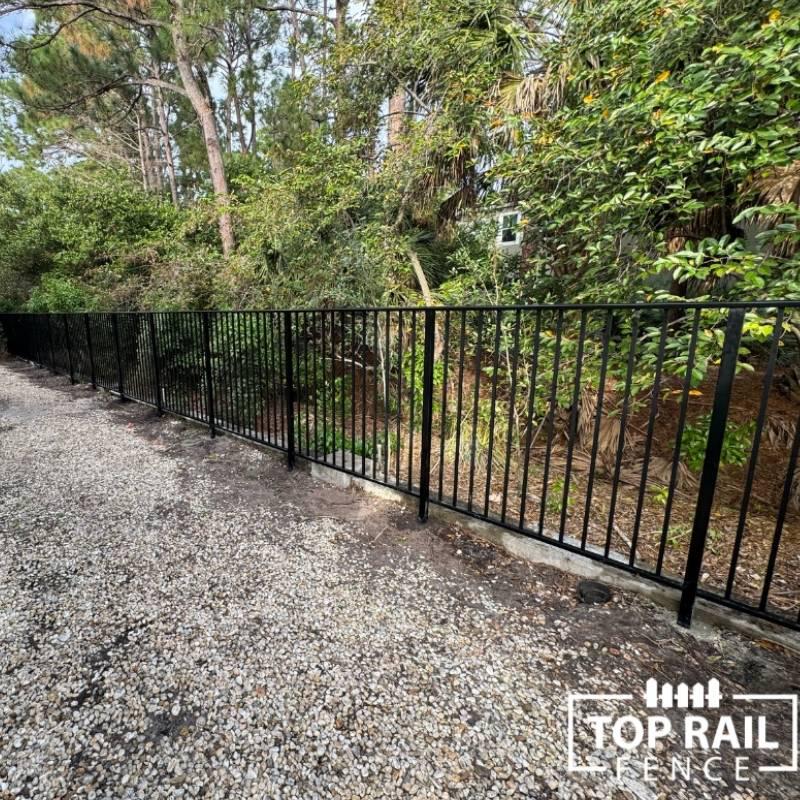 Aluminum metal fence install from Top Rail Fence