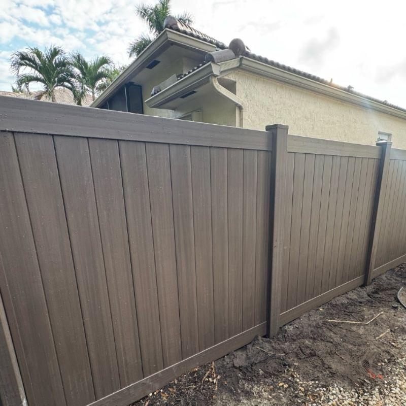 vinyl privacy fence install from Top Rail Fence