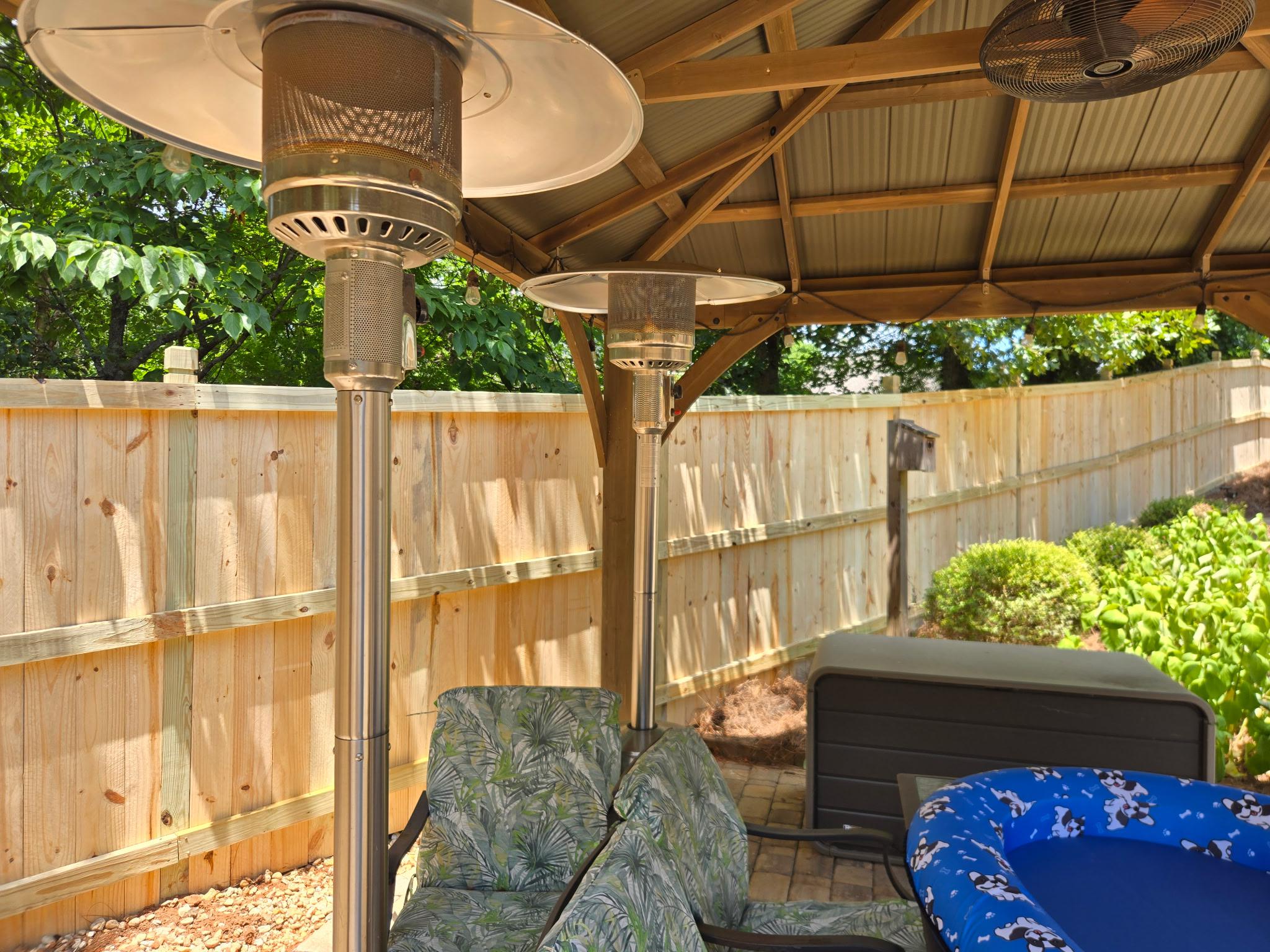 wood cap and trim fence installed by top rail fence