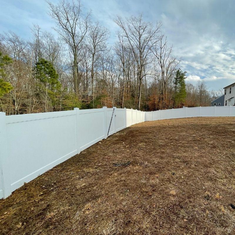New vinyl fence installation by Top Rail Fence