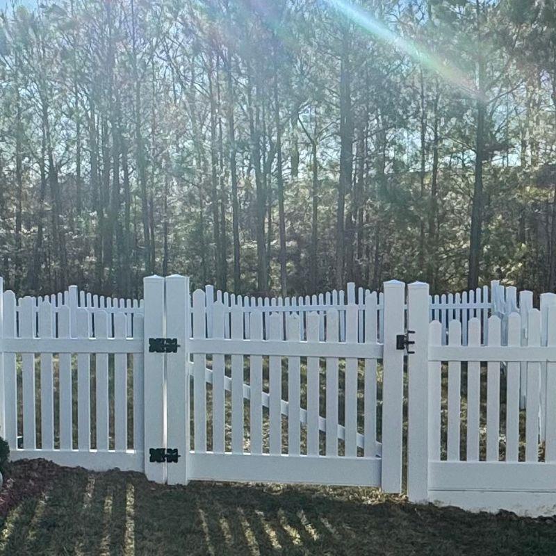 white vinyl fence and gate