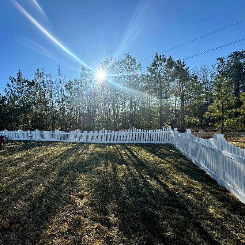 New white vinyl fence installed