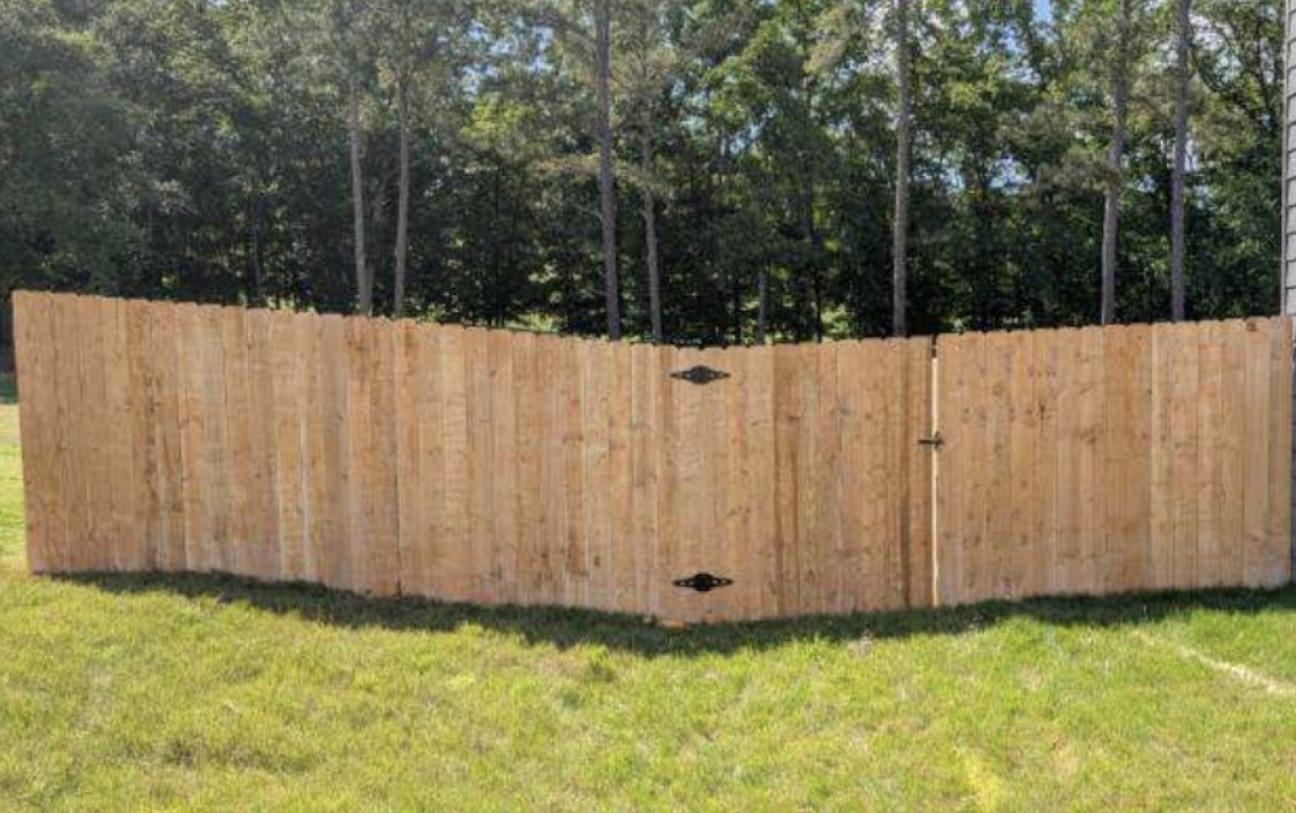 stockade fence installed by top rail fence atlanta