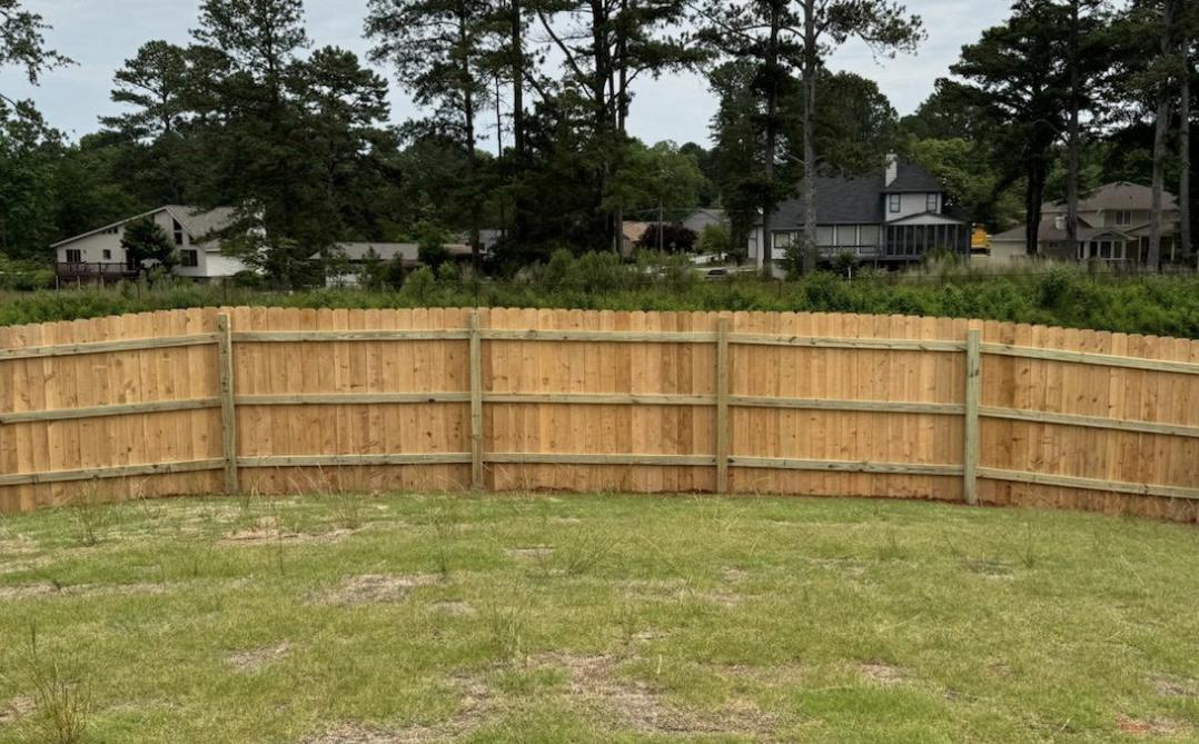 wood stockade fence installed by top rail fence atlanta