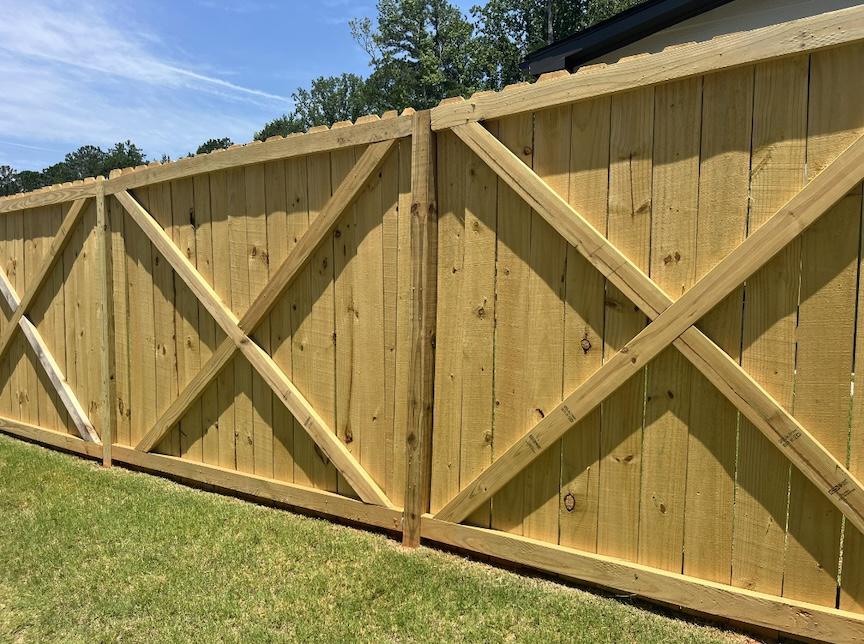 stockade fence installed by top rail fence atlanta
