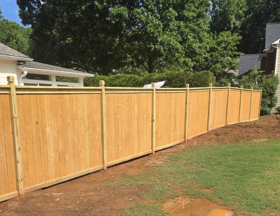 cap and trim fence installed by top rail fence atlanta