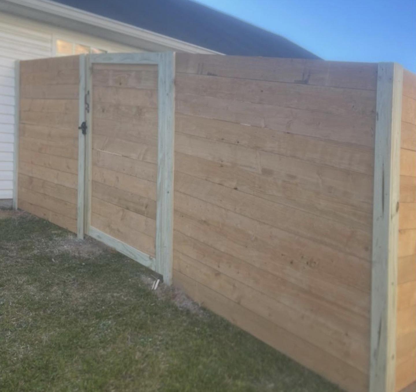 horizontal fence installed by top rail fence atlanta