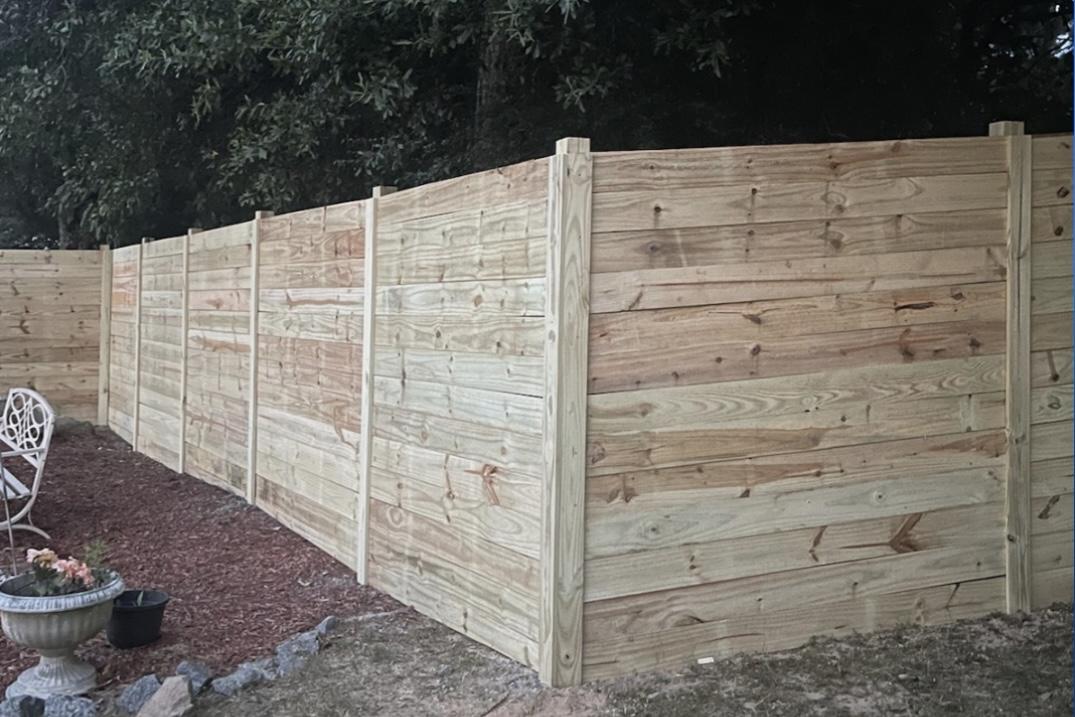 horizontal fence installed by top rail fence