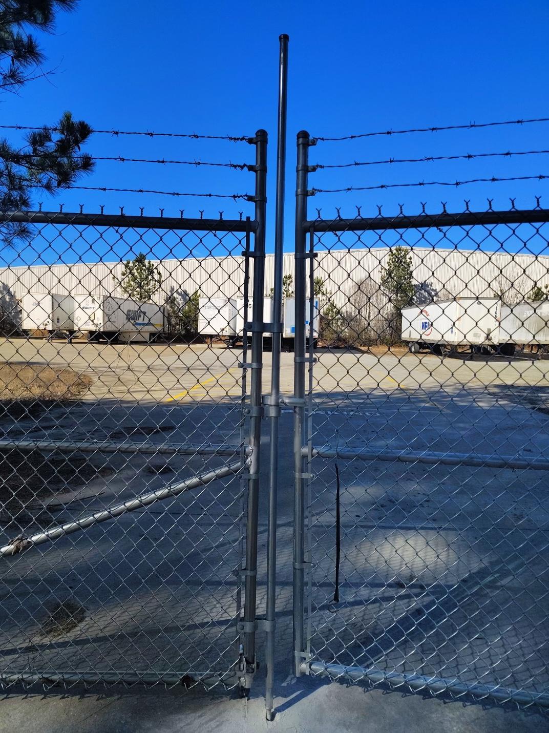 chain  link gate installed by top rail fence atlanta