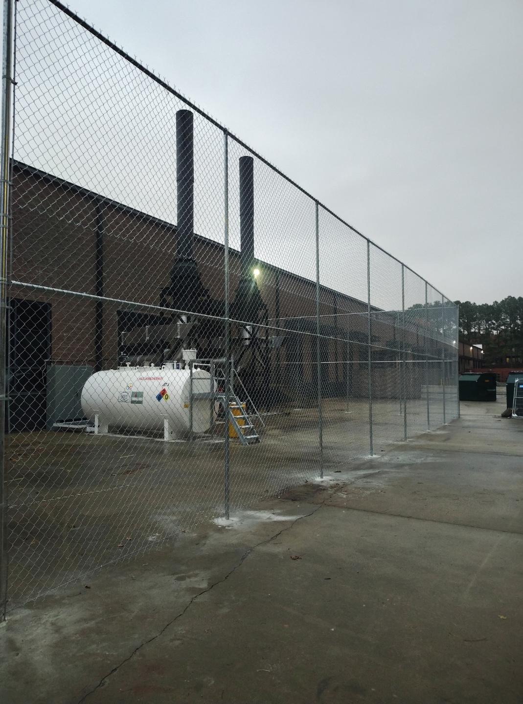 galvanized chain fence installed by top rail fence atlanta