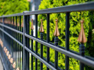 Smooth top with spear picket wrought iron fence
